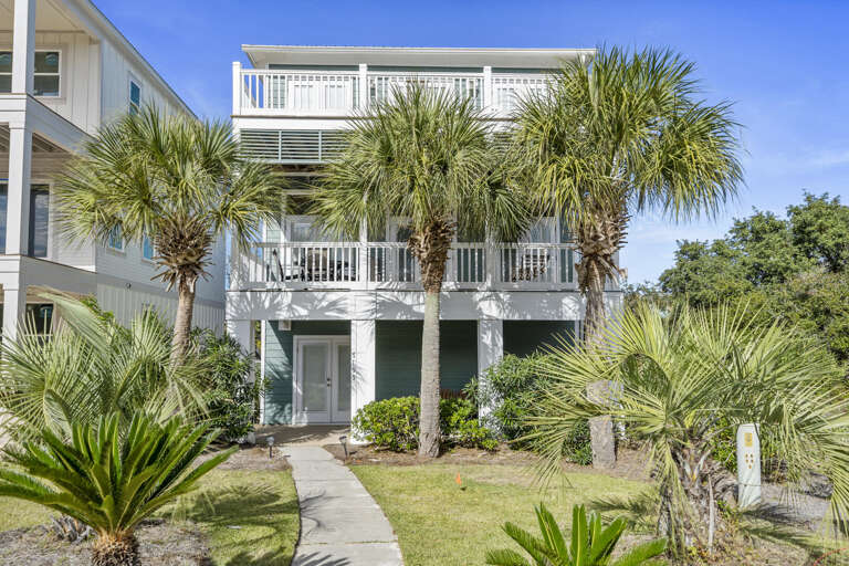 Three-story Vacation House With Balconies And Palm Trees