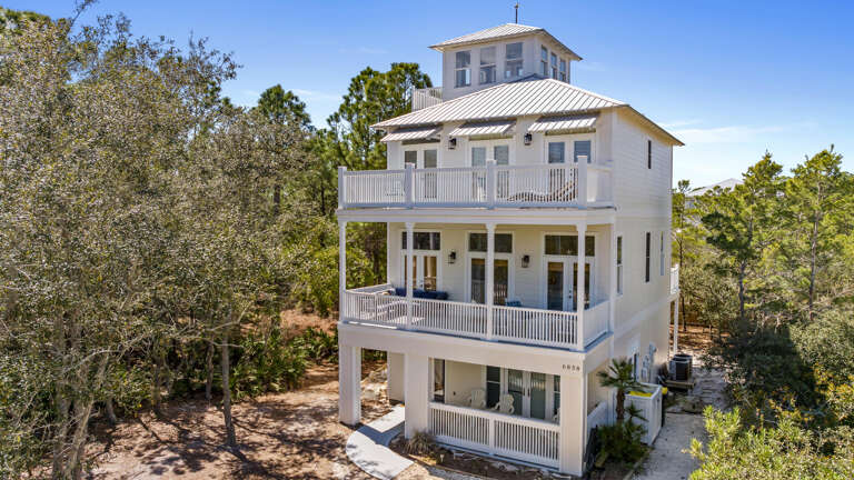 Vacation Rental Nestled In Nature, Neutral-toned Structure Surrounded By Serene Scenery
