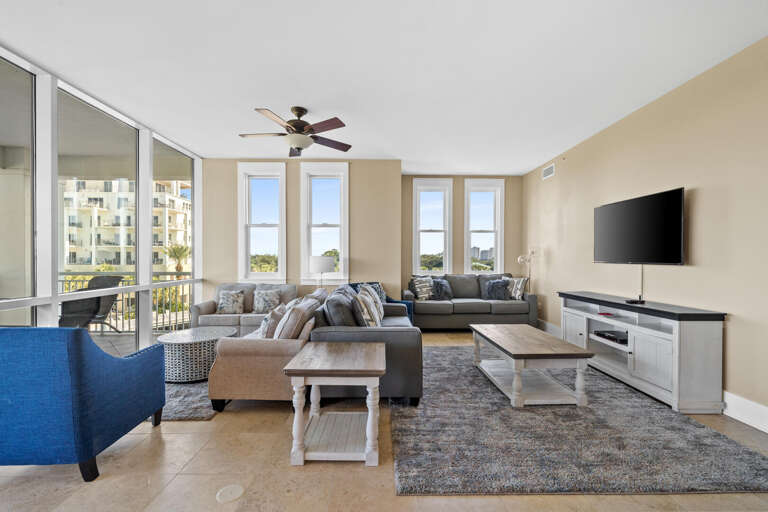 Bright Balcony-bordered Living Space, Sleek Sofa Set, Serene Seaside Scene