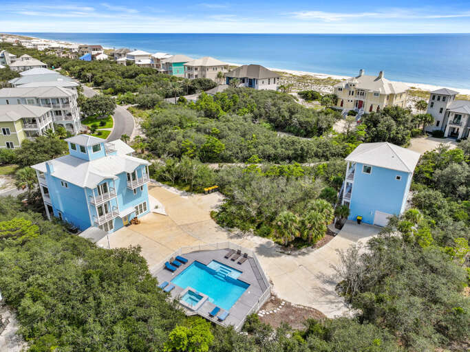 Seaside Structures Surrounded By Greenery