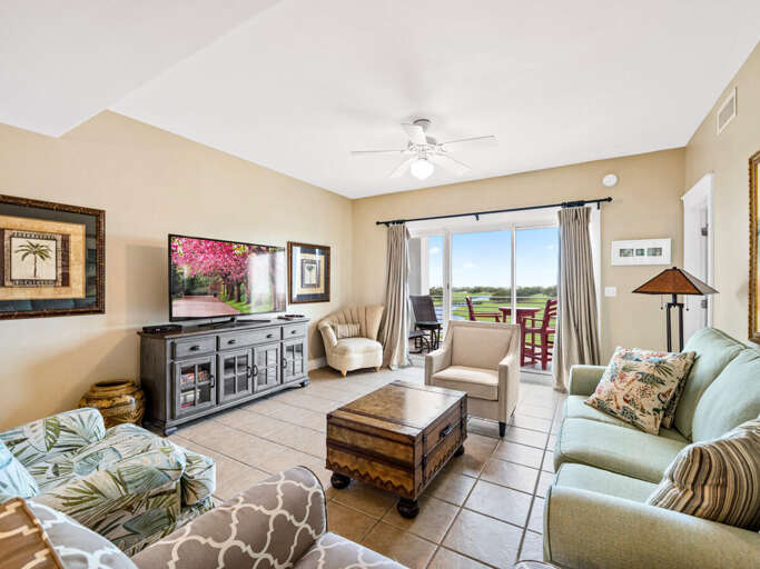 Living Room Leading To Balcony, Bright Light Streaming, Furniture Facing Television