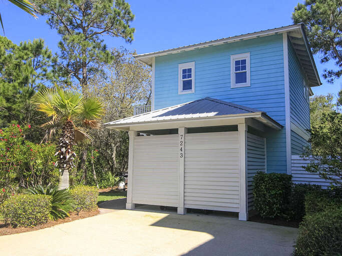 Blue Building Beside Garage, Green Grove Glimpses