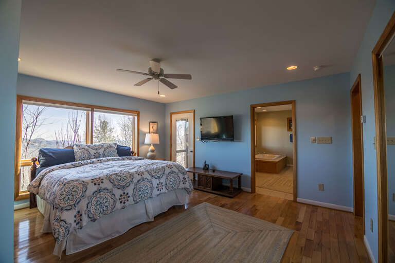 Bedroom with king bed and full bathroom