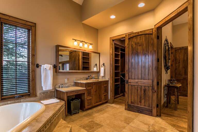 Full bathroom with soaking tub Full bathroom with soaking tub