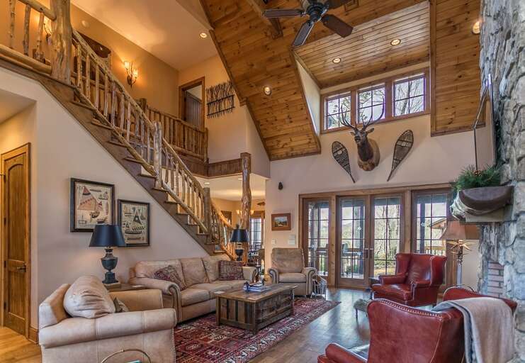 Open living room area with TV and fireplace Open living room area with TV and fireplace