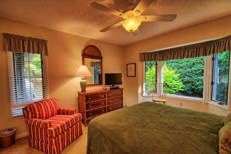 Main level bedroom with queen bed