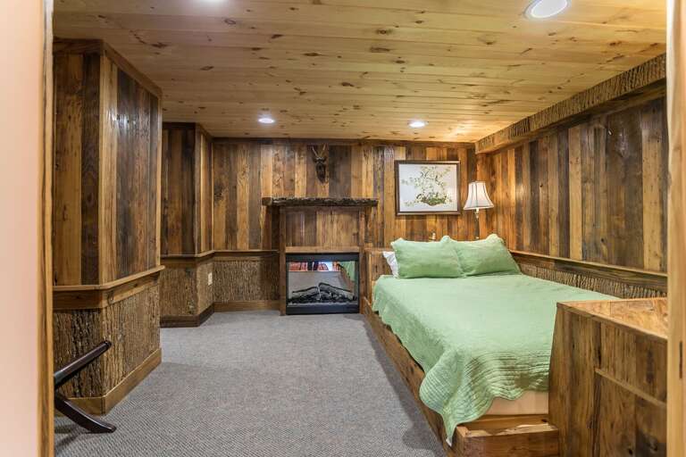 Lower level room with queen bed