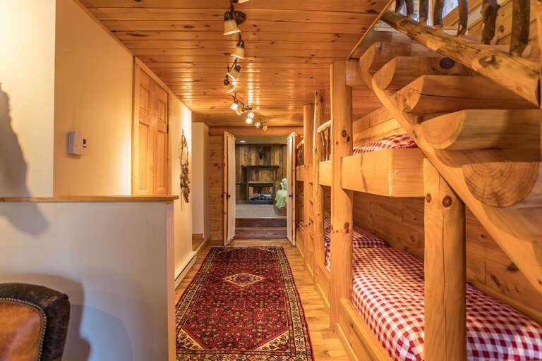 Lower level room with two sets of twin bunks