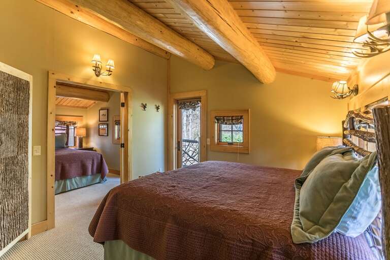 Upper level bedroom with king bed