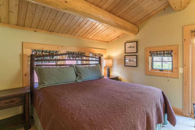 Upper level bedroom with king bed