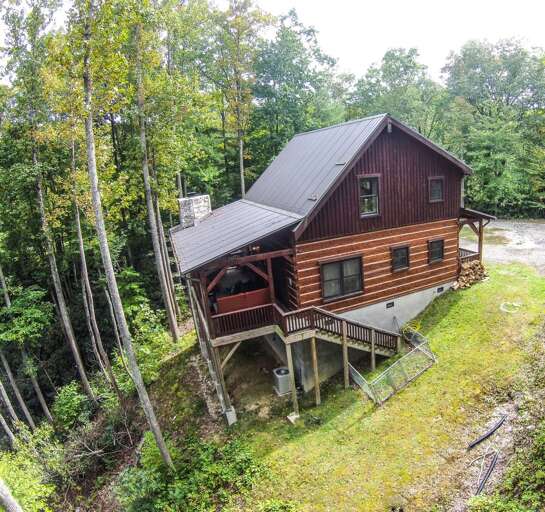 Rustic log cabin in the clouds