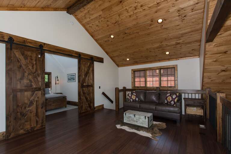 Loft area, barn doors leading to master Loft area, barn doors leading to master