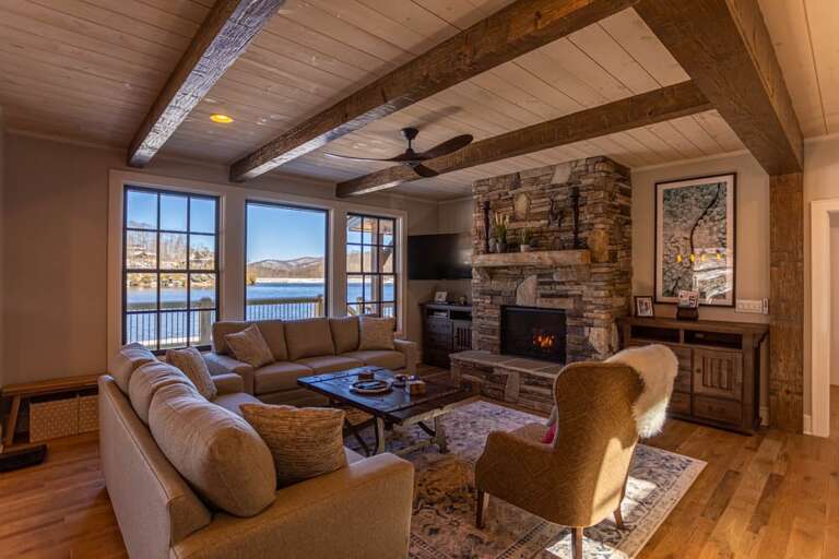 Living Room With Fireplace And Lake View