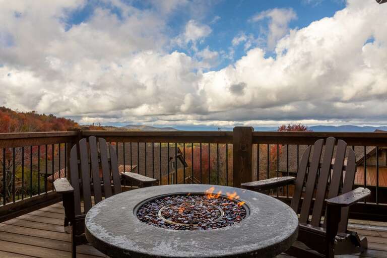 Outdoor Patio With Fire Pit And Lake View