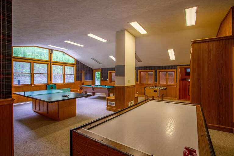 Fabulous game room with four full sized tables, TV Fabulous game room with four full sized tables, TV