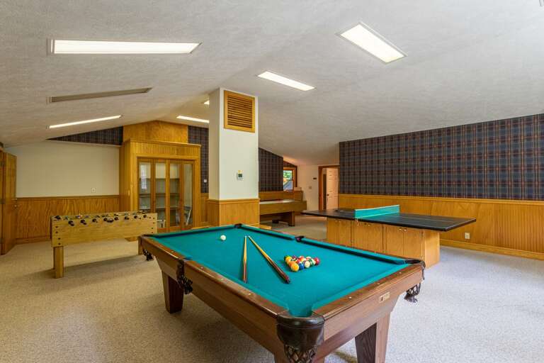 Fabulous game room with four full sized tables, TV Fabulous game room with four full sized tables, TV
