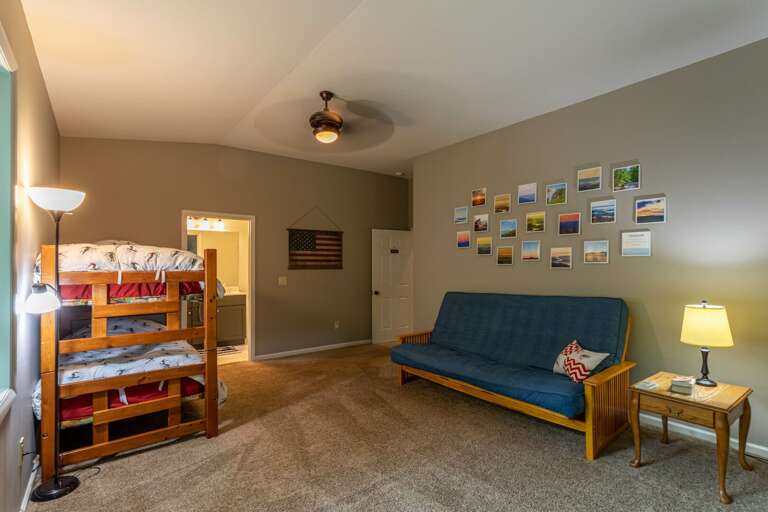 Scout Room with three sets of bunk beds and a futon Scout Room with three sets of bunk beds and a futon