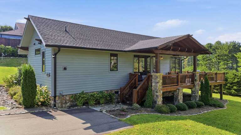 Accessing this home made easy with a flat driveway and short stair set.