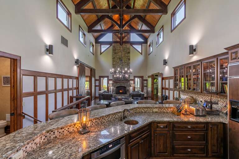 Spacious Kitchen Interior With High Ceilings And Wooden Cabinets