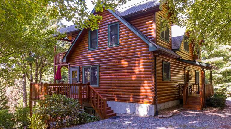 Wooden Two-story House Surrounded By Trees
