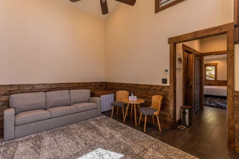 Interior Living Space With Sofa And Dining Table