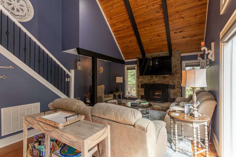 Living Room With Fireplace In Vacation Rental Living Room With Fireplace In Vacation Rental