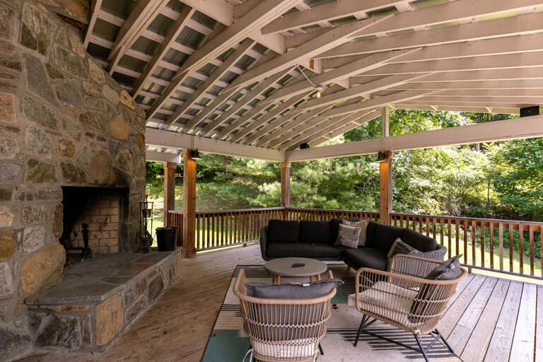 Patio With Pergola, Stone Fireplace, Plush Seating, Wooden Deck