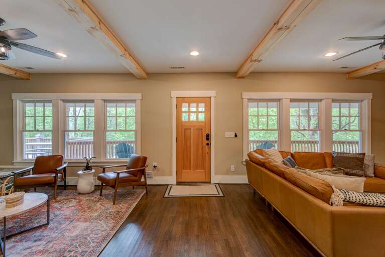 Living Room Interior With Sofas And Large Windows