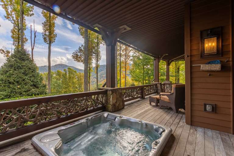 Lower level porch with hot tub and seating.