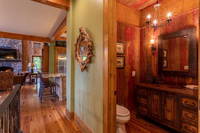 Main level half bathroom.