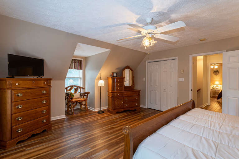 Upstairs bedroom with king bed and flat screen TV