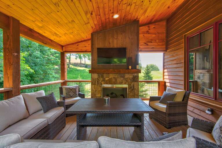 Wooden Terrace With Furniture And Greenery View