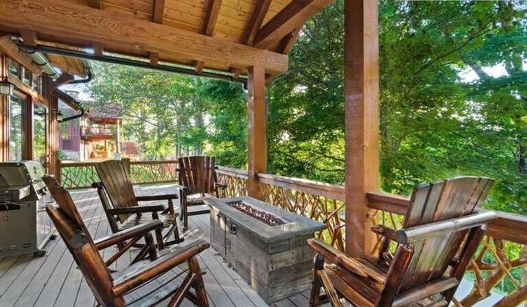 Wooden Porch With Chairs And Barbecue Grill