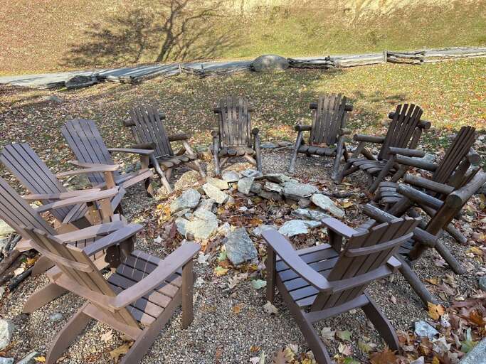 Timberwolf Lodge at EN fire pit in backyard
