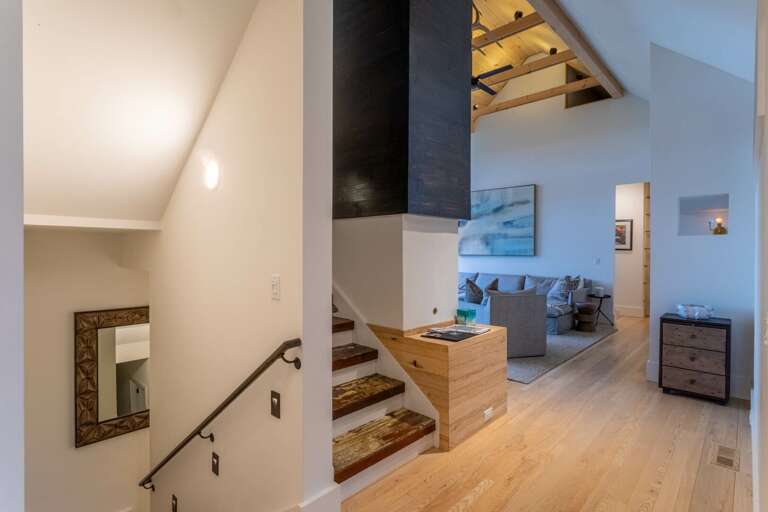 Interior View Of A Residential Space With Stairs And Living Area