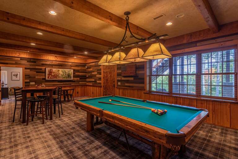 Lower level game room with pool table.