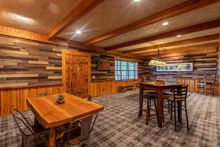 Lower level game room with pool table.