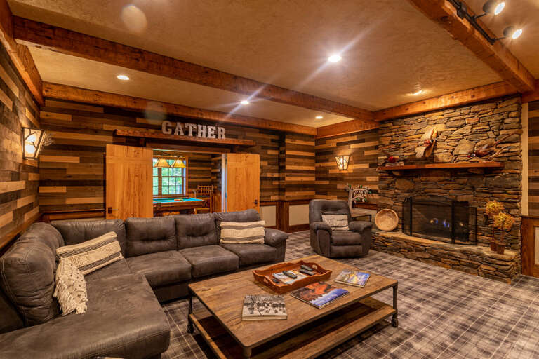Lower level living area with gas fireplace.