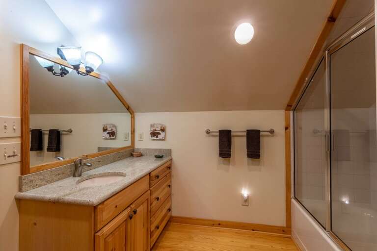 Full bathroom upstairs with shower/tub combo