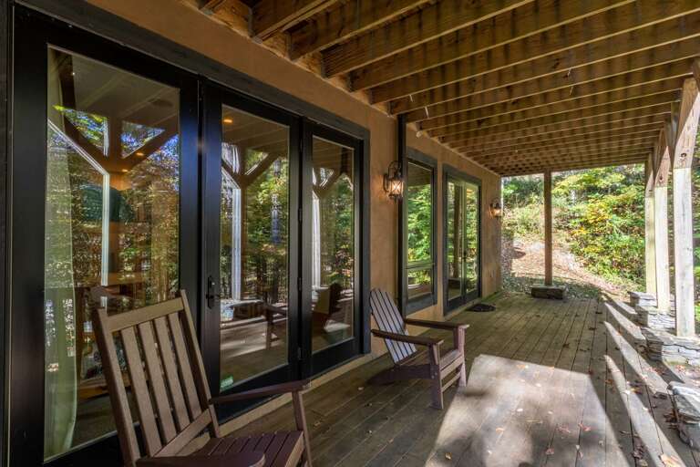 Lower level back porch seating. Lower level back porch seating.