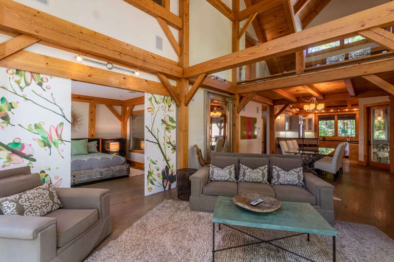 Main level living room with wood burning fireplace. Main level living room with wood burning fireplace.