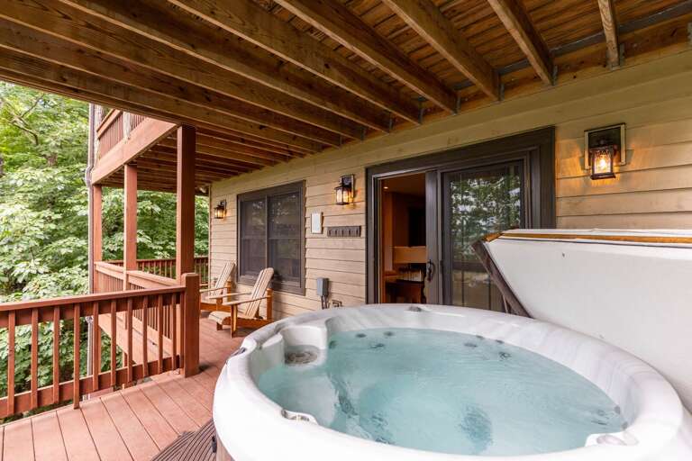 Covered deck and hot tub