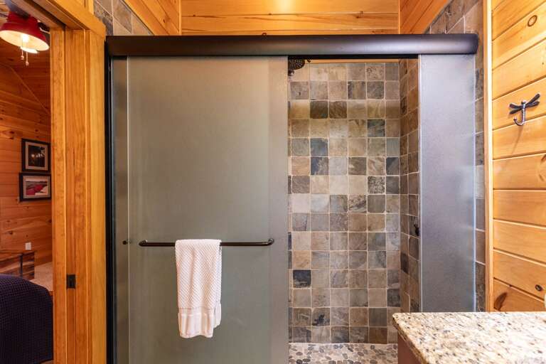 Stone-tiled shower