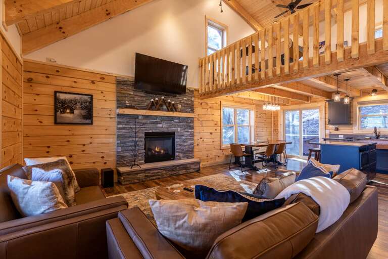 Rustic Wooden Vacation Rental With Lofted Layout And Stony Fireplace