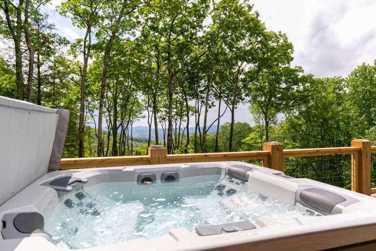 Deckside Hot Tub With Lush, Leafy Backdrop
