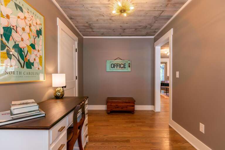 Step into the office space to catch up on any remote work you may bring