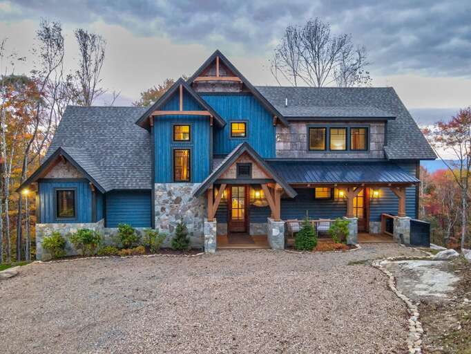 Blue Vacation Rental Nestled In Nature At Dusk