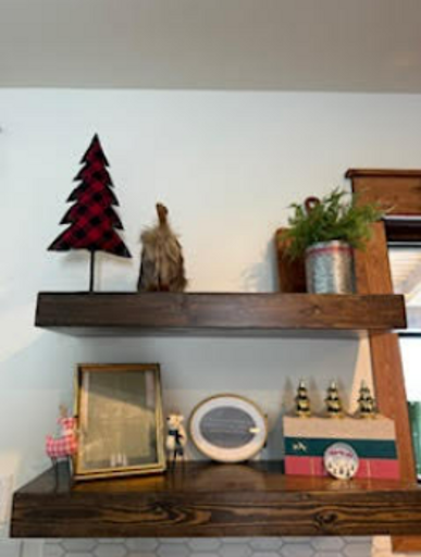 Shelf Scene With Seasonal Decor In A Vacation Rental