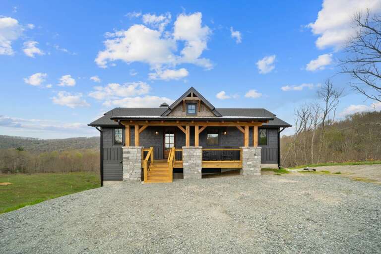 Wooden House Nestled In Natural Setting With Expansive Views