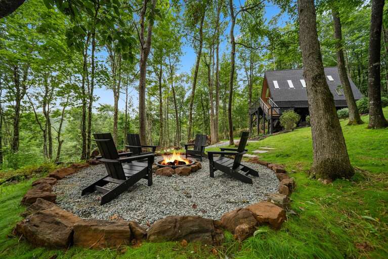 Fire-lit Forest Retreat, Chairs Encircling Flames, Vacation Rental Nestled In Nature